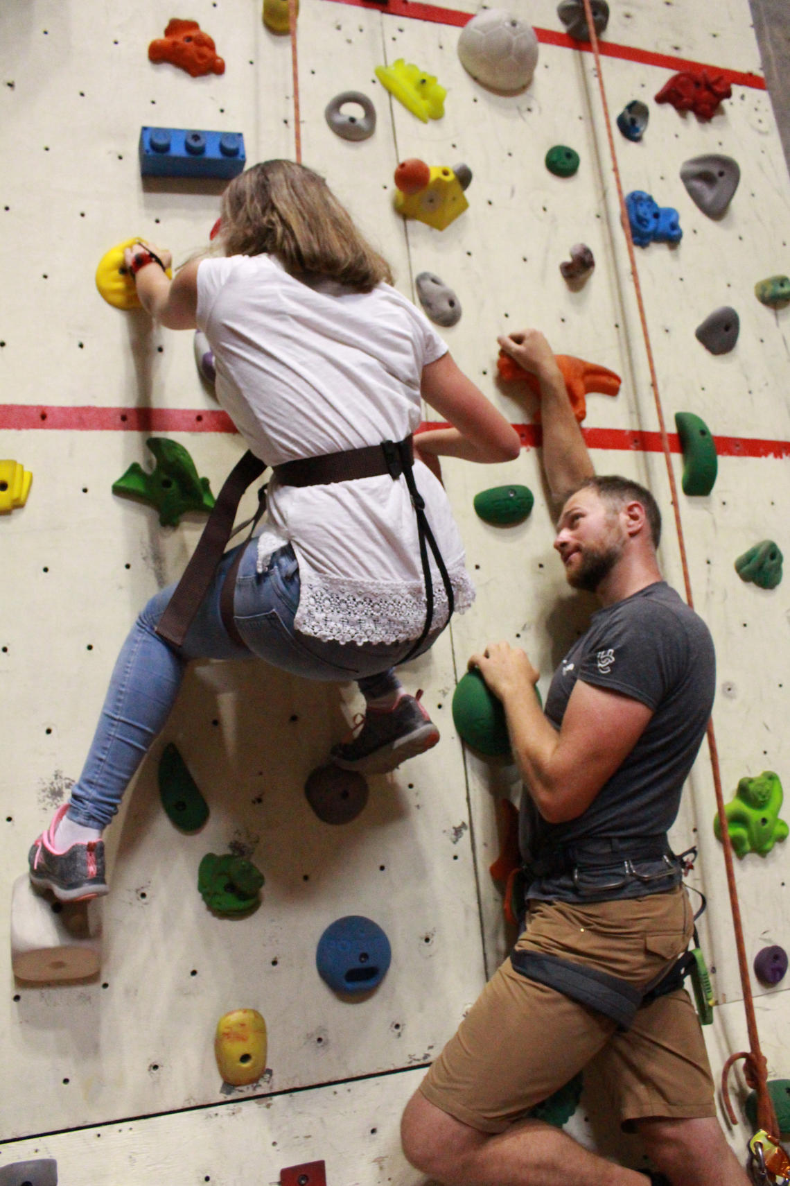 Adapted campers try out the climbing wall. 