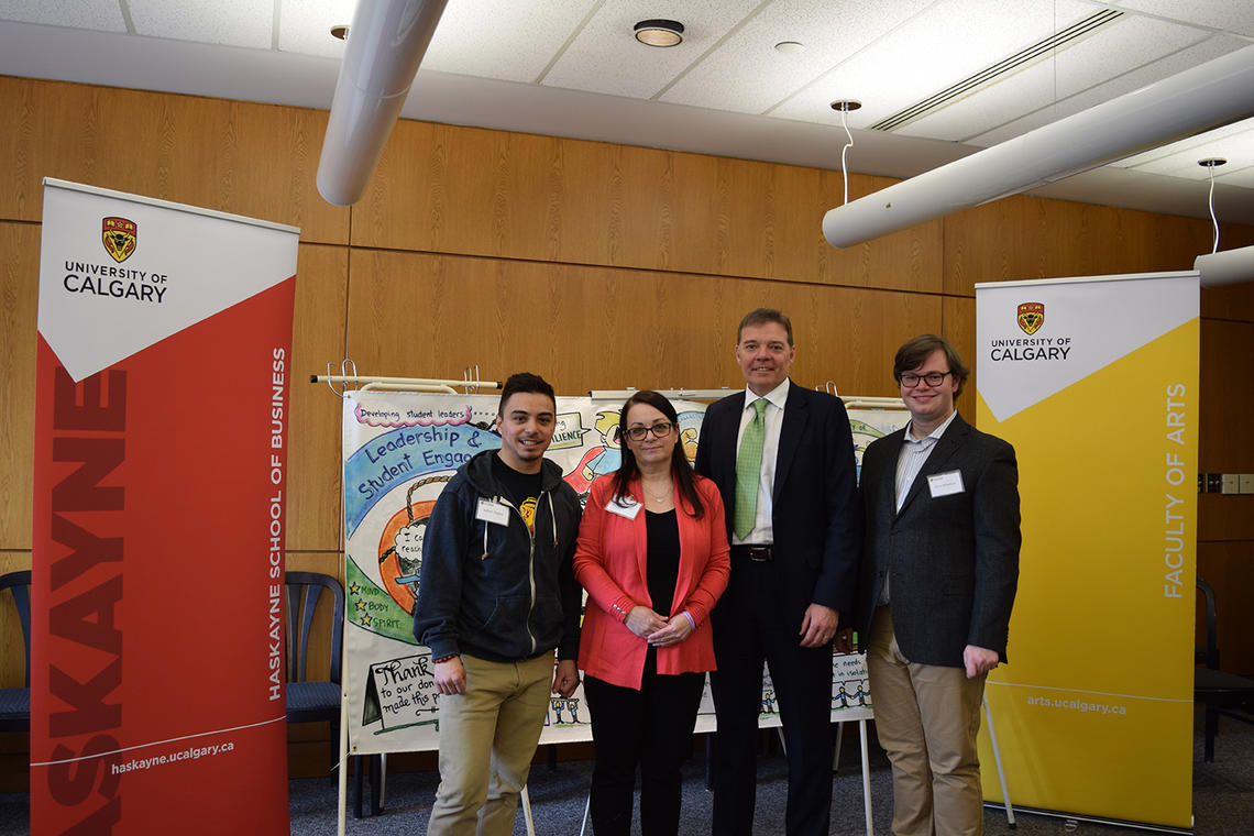 Ryan Mikalson (far right) with the Jordan Segura family and Richard Sigurdson, dean of the Faculty of Arts.