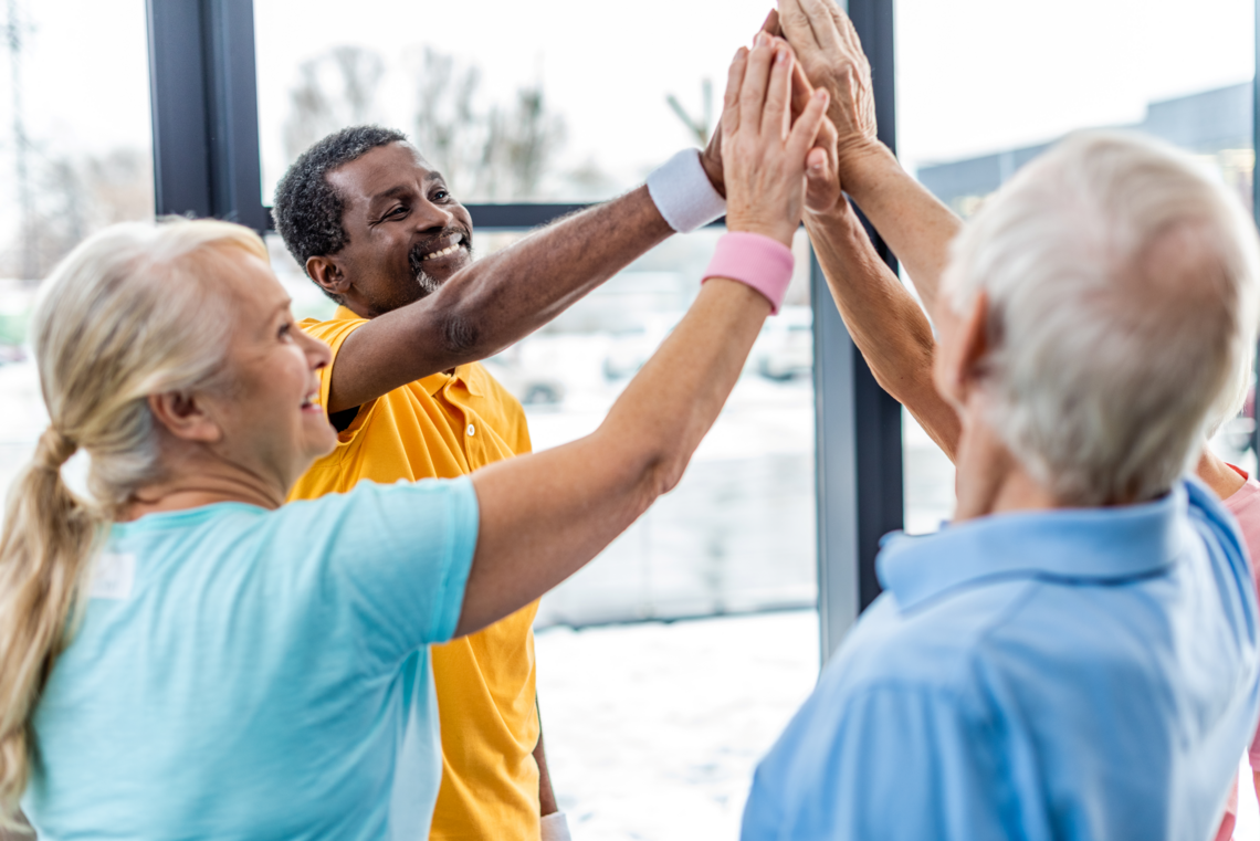 Older adults high five