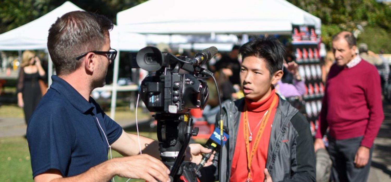 Bill Zheng interviewed by Global News at Sept. 27 Pop Up Care Village.