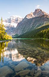 Lake in Jasper National Park, with mountains in background