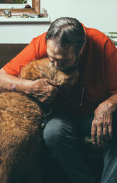 Stan Parsons with his golden retriever, Jellybean.