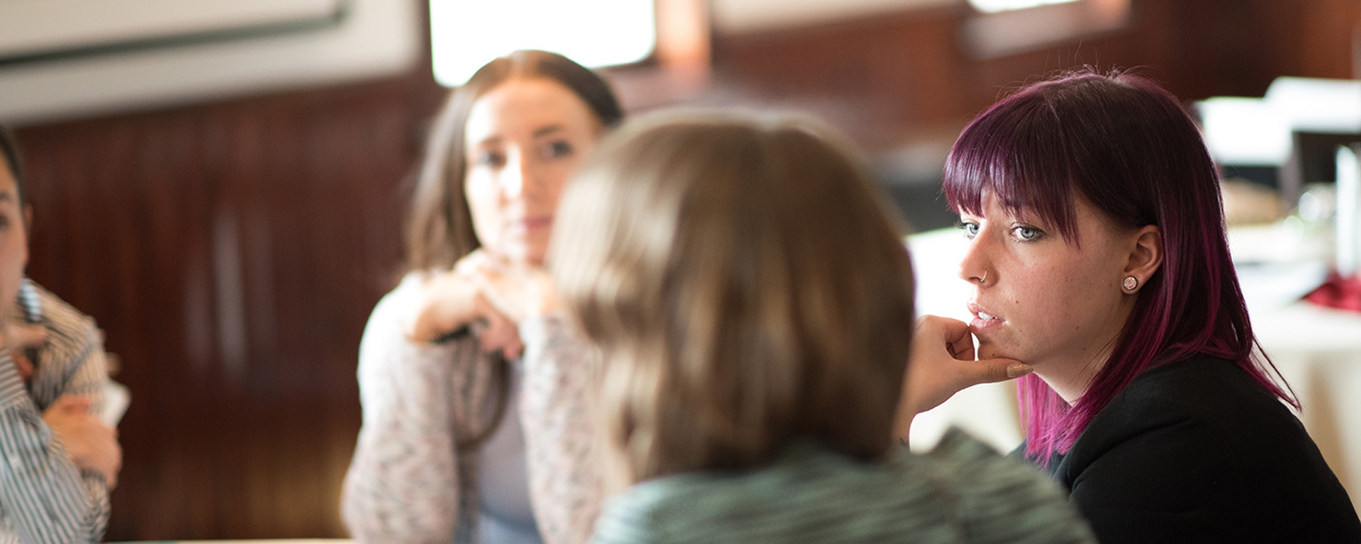 Community members and social workers at a meeting and workshop for the Identity Based Wrap Around Initiative at Fort Calgary, Faculty of Social Work UCalgary