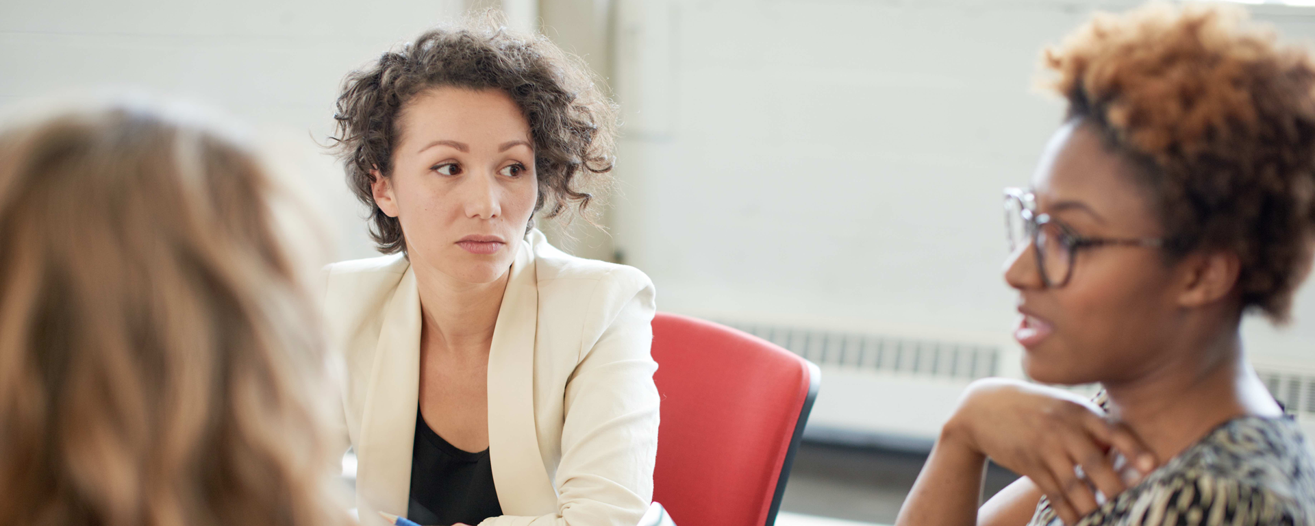 Women in a meeting- University of Calgary Faculty of Social Work