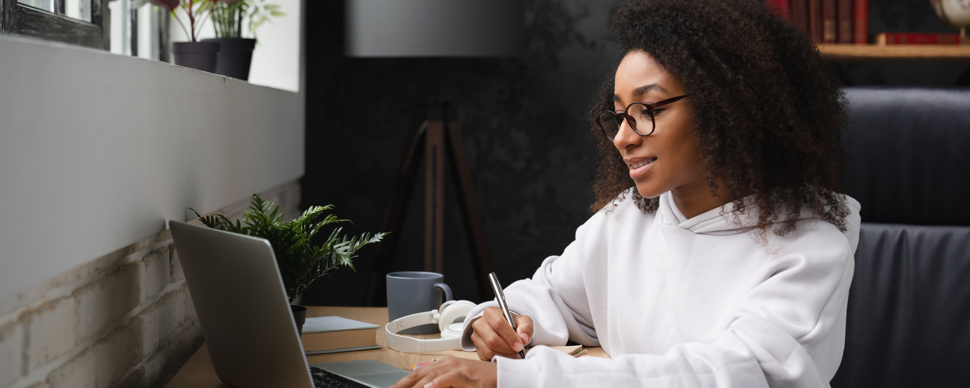 Female student in front of a computer