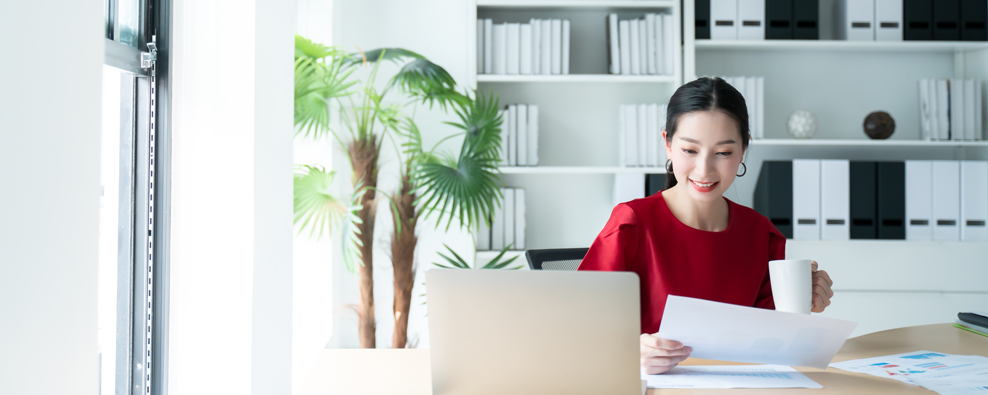 Female student in front of a computer
