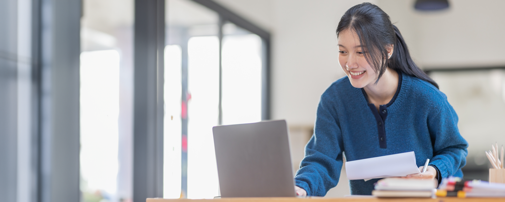 Female student in front of a computer