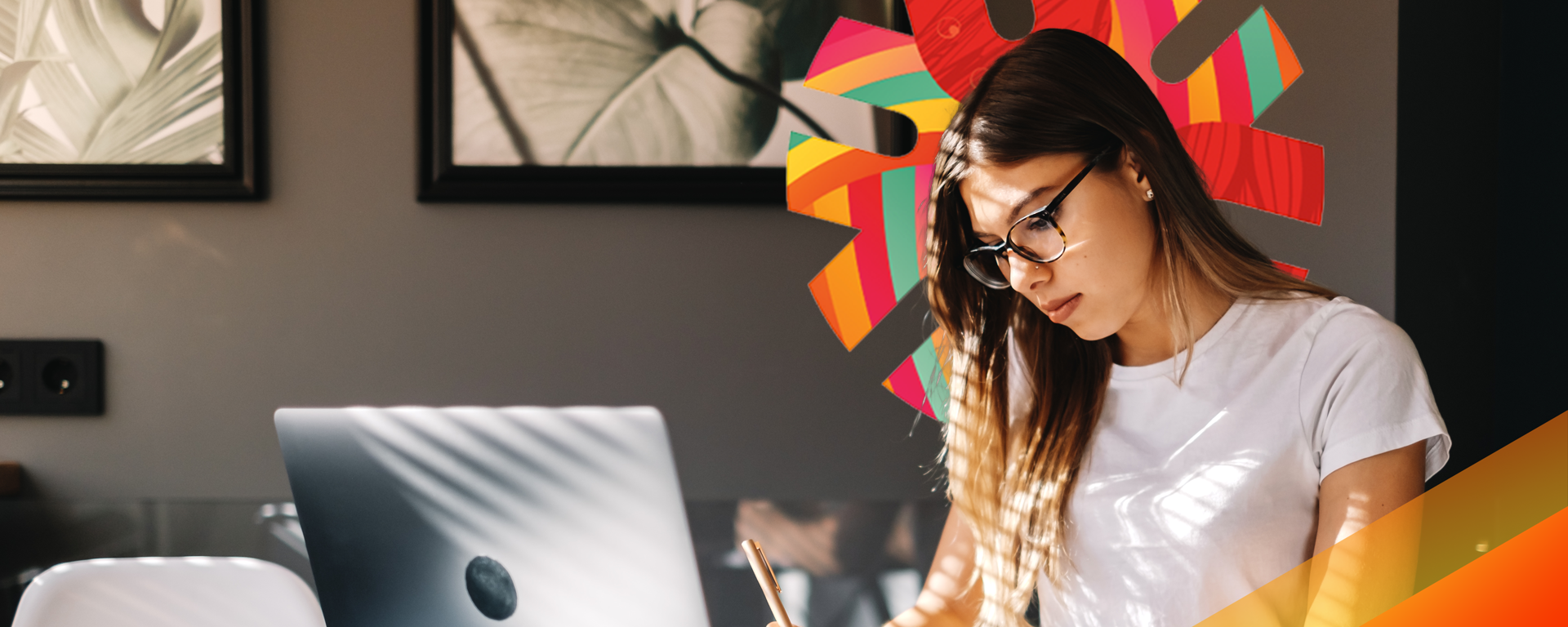 Student looking at laptop promoting UCalgary Online Master of Social Work