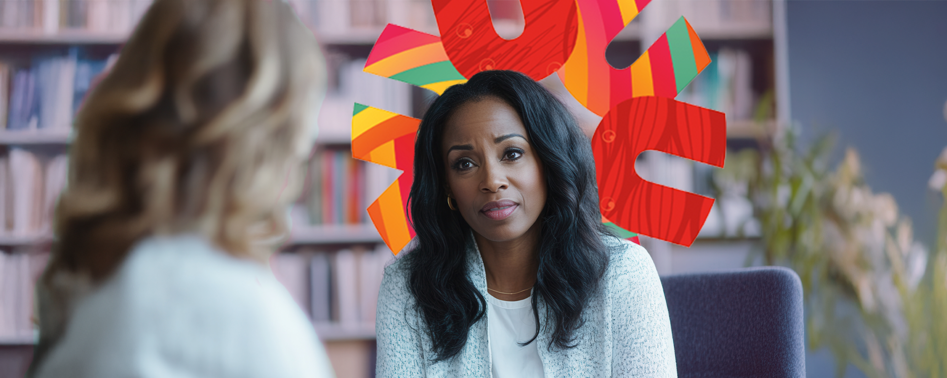 Black therapist in a serene office setting, using empathetic communication and active listening with clients