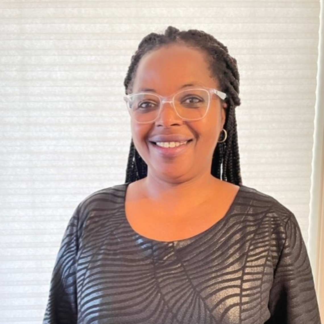 Dr. Regine King 