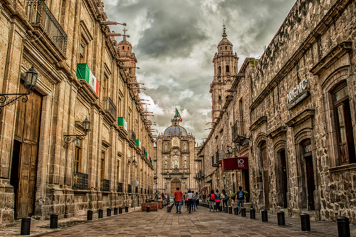 Mexico Flag on Brown 2-storey Building