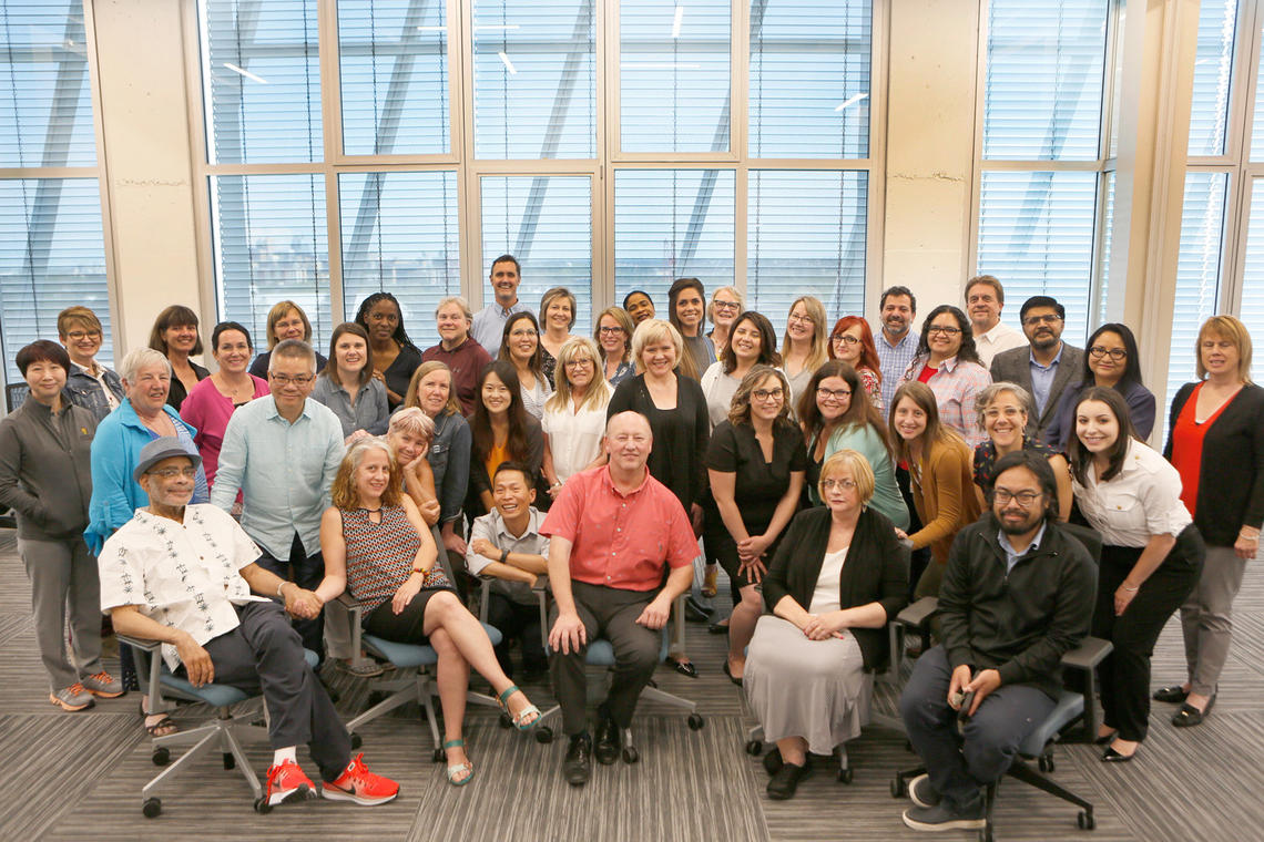 A group photo of UCalgary Faculty of Social Work faculty and staff, taken in August of 2019 A group photo of UCalgary Faculty of Social Work faculty and staff, taken in August of 2019