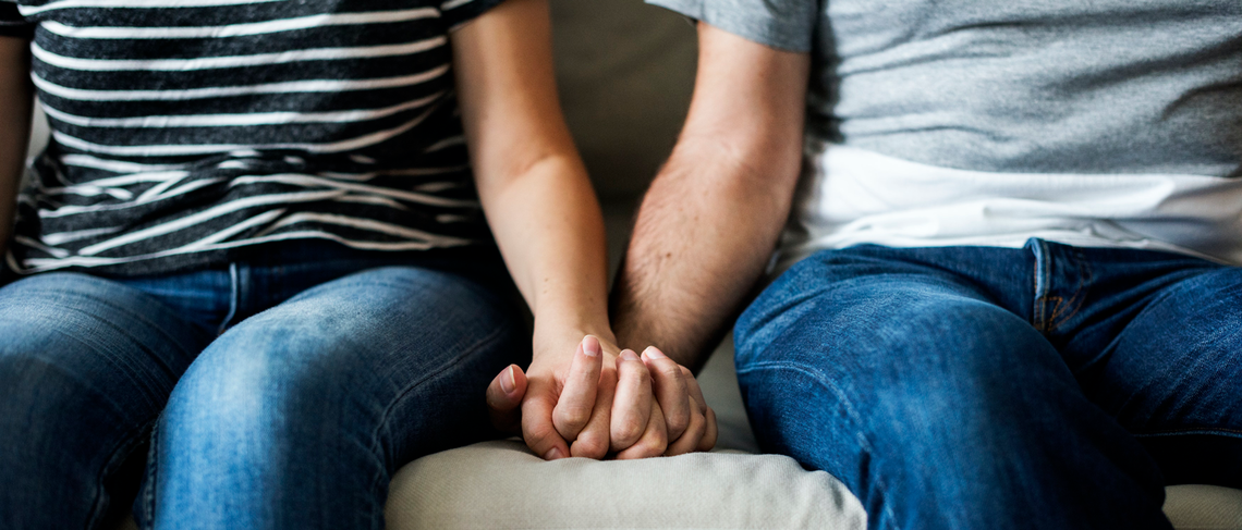 Couple holding hands 