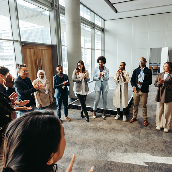 a group of people standing in a circle