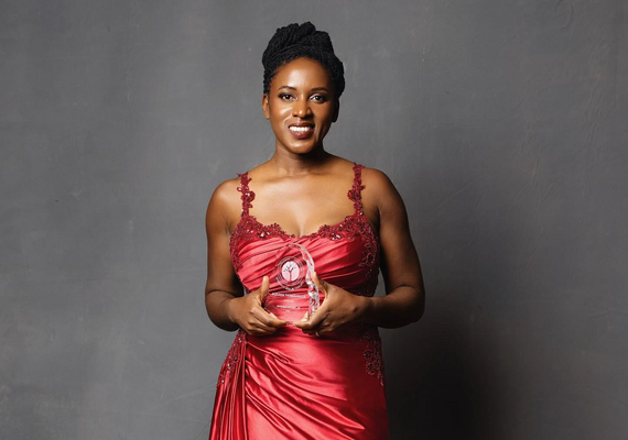 Patrina Duhaney holding Black Chambers Award